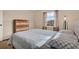 Bright bedroom with neutral walls, plush carpet, and a large window at 2764 W Covington Dr, Deltona, FL 32738