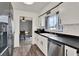 Bright kitchen with view into dining room, stainless steel appliances, and great natural light at 2764 W Covington Dr, Deltona, FL 32738