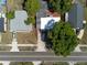 Overhead aerial view displaying properties and their landscaping along the street at 2903 E Michigan St, Orlando, FL 32806