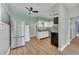 Bright, updated kitchen features stainless steel appliances and modern cabinetry at 2903 E Michigan St, Orlando, FL 32806