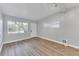 Living room featuring modern floors, front door and multiple windows at 2903 E Michigan St, Orlando, FL 32806