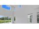 Bright living room features soaring ceilings, large windows, and great natural light at 3024 Kensington Ave, Davenport, FL 33837