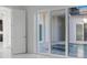 View of an open patio and pool from inside at 3024 Kensington Ave, Davenport, FL 33837