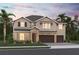 Beautiful two-story home featuring a three car garage and stone accents at 3028 Water Clover Ct, Apopka, FL 32712