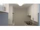 Contemporary kitchen showcasing modern appliances, ample cabinet space, and sleek design at 3060 George Mason Ave # 10C, Winter Park, FL 32792