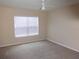 Bedroom featuring a window with blinds and a ceiling fan with a light fixture at 3364 Westchester Square Blvd # 204, Orlando, FL 32835