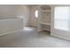 Cozy bonus room with carpet and built-in desk area, ideal for a home office or study space at 3364 Westchester Square Blvd # 204, Orlando, FL 32835
