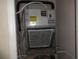 Furnace with ENERGYGUIDE sticker and filter in unit at 3364 Westchester Square Blvd # 204, Orlando, FL 32835
