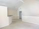 Inviting living room with vaulted ceilings, ceiling fan, neutral carpet and convenient breakfast bar at 3364 Westchester Square Blvd # 204, Orlando, FL 32835