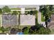 Drone shot of property boundaries, showcasing lot size, landscaping and proximity to neighboring houses at 3436 Herringridge Dr, Orlando, FL 32812
