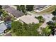 Aerial perspective of a property, surrounded by lush greenery and neighboring homes at 3436 Herringridge Dr, Orlando, FL 32812