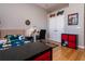 Bedroom features wood floors, themed decor, and a large window for lots of light at 3436 Herringridge Dr, Orlando, FL 32812