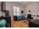 bedroom featuring wood floors, themed decor, and a large window for natural light at 3436 Herringridge Dr, Orlando, FL 32812