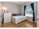 Bright bedroom features hardwood floors, daybed, and plenty of natural light at 3436 Herringridge Dr, Orlando, FL 32812