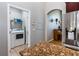 Kitchen featuring stainless steel refrigerator and a view of the laundry room at 3436 Herringridge Dr, Orlando, FL 32812