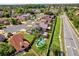 An aerial shot of a home with solar panels, a pool, and a large backyard in a residential neighborhood at 368 Amethyst Ct, Lake Mary, FL 32746