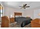 Bedroom with neutral tones, ceiling fan, and ample natural light at 368 Amethyst Ct, Lake Mary, FL 32746