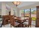 Open-concept dining area with backyard views at 368 Amethyst Ct, Lake Mary, FL 32746