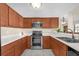 Well-lit kitchen with stainless steel appliances and ample counter space at 368 Amethyst Ct, Lake Mary, FL 32746