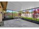 Covered patio with seating area and views of the backyard at 368 Amethyst Ct, Lake Mary, FL 32746