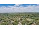A high angle view of the community with homes and a pond at 5163 Lighthouse Rd, Orlando, FL 32808