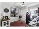 Cozy bedroom with a ceiling fan, closet, artwork, and a neutral color palette at 5163 Lighthouse Rd, Orlando, FL 32808