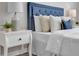 A charming bedroom features neutral walls, hardwood floors, and lots of natural light at 7021 Della Dr # 52, Orlando, FL 32819