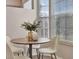 Bright breakfast nook featuring a round table and a view of the outdoors at 7021 Della Dr # 52, Orlando, FL 32819