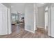 Open entryway that looks into a spacious living room with large windows and neutral decor at 7021 Della Dr # 52, Orlando, FL 32819