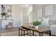 Cozy living room with natural light, stylish decor, and a comfortable seating area at 7021 Della Dr # 52, Orlando, FL 32819