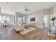 Inviting living room showcasing an open floor plan with lots of natural light, stylish decor, and a ceiling fan at 7021 Della Dr # 52, Orlando, FL 32819