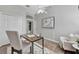 Office with hardwood floors, a patterned rug, and a modern desk and chair at 7021 Della Dr # 52, Orlando, FL 32819