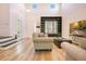 Bright living room boasting high ceilings, with elegant decor and comfortable seating around the wooden coffee table at 8555 Abbotsbury Dr, Windermere, FL 34786