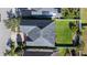 Aerial view of the home's roof and well maintained backyard with lush green grass and a privacy fence at 8565 Tallfield Ave # 1, Orlando, FL 32832
