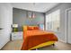 This is a cozy bedroom that features neutral-toned walls, carpet floors, and lots of natural light at 860 N Orange Ave # 226, Orlando, FL 32801