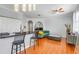 Open concept living room and kitchen with hardwood floors at 860 N Orange Ave # 226, Orlando, FL 32801