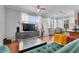 Bright living room with stylish furniture, wood floors and large windows at 860 N Orange Ave # 226, Orlando, FL 32801