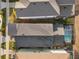 Aerial view showcasing the layout, privacy fencing, and pool of this property at 8953 Amelia Downs Trl, Kissimmee, FL 34747