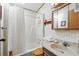 Practical bathroom featuring a shower-tub combination, a classic vanity, and a medicine cabinet at 9000 Us Highway 192 # 624, Clermont, FL 34714