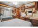 Comfortable bedroom with a large closet, a built-in vanity, and cabinetry, maximizing storage space at 9000 Us Highway 192 # 624, Clermont, FL 34714