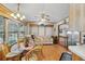 Charming dining area with a glass-top table, seating for four, and natural light pouring in at 9000 Us Highway 192 # 624, Clermont, FL 34714