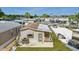 Charming home featuring a well-maintained yard, private driveway, and mature palm trees in a tranquil community at 9000 Us Highway 192 # 624, Clermont, FL 34714