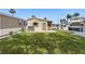 Charming home exterior features a well-manicured lawn and quaint outdoor space at 9000 Us Highway 192 # 624, Clermont, FL 34714