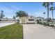 Beautiful home with a well-maintained lawn, convenient driveway, and charming curb appeal in a serene neighborhood at 9000 Us Highway 192 # 624, Clermont, FL 34714