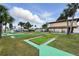 Scenic mini-golf course offering recreational fun surrounded by mature palms and picturesque views on a sunny day at 9000 Us Highway 192 # 624, Clermont, FL 34714