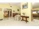 Foyer with tile flooring and an open layout, leading to the dining and living areas at 9311 Sonia St, Orlando, FL 32825