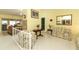 Spacious living room with floral sofas, tile floors, and an open layout at 9311 Sonia St, Orlando, FL 32825