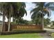 Community entrance sign for Deerwood, surrounded by lush green landscaping at 9311 Sonia St, Orlando, FL 32825