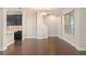 Dining area featuring dark wood floors, a chandelier, and a seamless flow to the kitchen at 970 Timberview Rd, Clermont, FL 34715