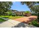 Charming home with a well-manicured lawn and a four car garage at 9907 Beaufort Ct, Windermere, FL 34786